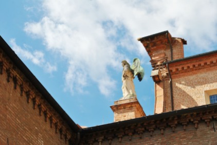Statue of an angel on a church in Ferrara